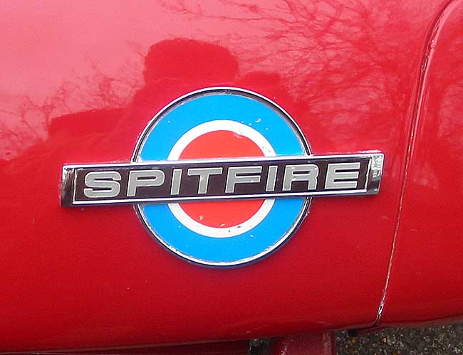 GENUINE TRIUMPH SPITFIRE BADGE INSERT EMBOSSED POST FREE UK ! 
